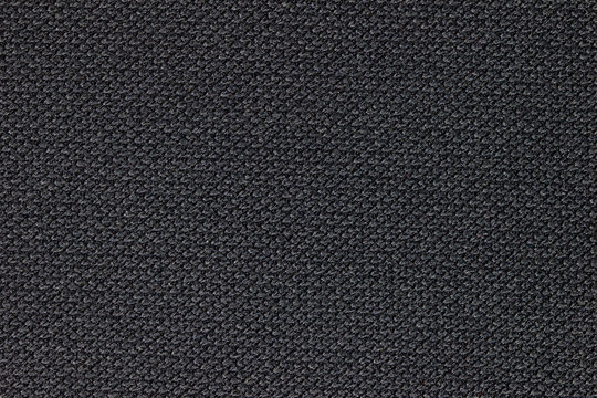 Texture of black fabric. Concept of fashion article background.
