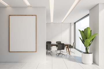 White panel conference room with poster