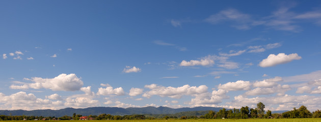 The white clouds have a strange shape.mountain and copy space