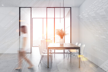 Woman walking in white dining room