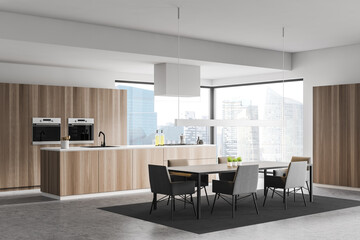Panoramic wooden kitchen corner with dining table