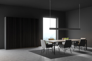 Gray dining room corner with wardrobe