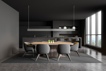Dark gray kitchen and dining room interior
