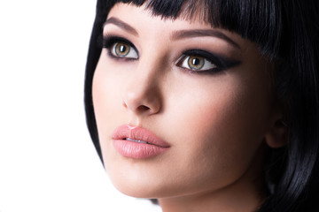 Fototapeta premium Beautiful brunette woman with fashion makeup.