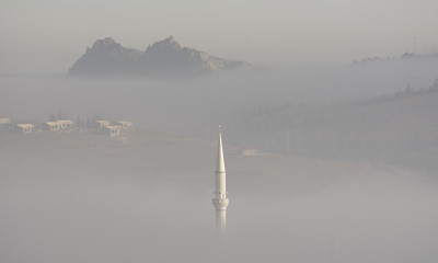 Minaret in the mist