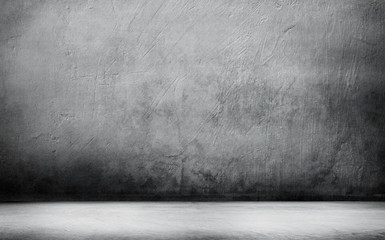 empty room with a concrete wall, gray background. Room for studio.