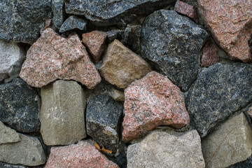 Huge stones lie in the park. Background. Texture.