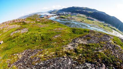 Fototapeta na wymiar Fisheye view of village Teriberka in the Barents sea coast. Kola peninsula, Murmansk Oblast, Russia