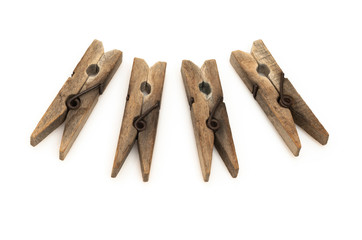 Wood clothespins isolated on white background