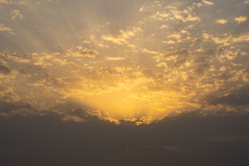 View of sky with sun rise beside ganga river.