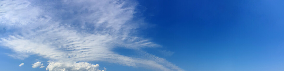 Fototapeta premium Panorama sky with cloud on a sunny day. Beautiful cirrus cloud. Panoramic image.