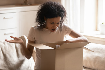 Disappointed biracial woman frustrated with wrong order