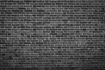 Fototapeta na wymiar dark grey / black brick wall background texture