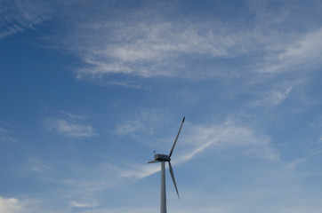Wind turbines anWind turbines and blue skiesd blue skies