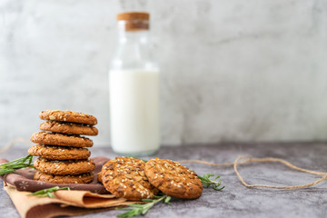 oatmeal cookies with milk on the table