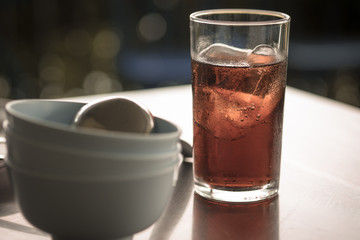 Cold soft drink refreshing pop flavoured with ice cubes