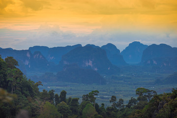 Close-up wallpaper view of high angle mountains, atmosphere surrounded by trees, blurred wind and fresh cool air during the day