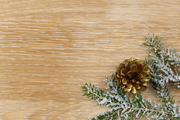 Pine cone close up with Christmas decoration on background.