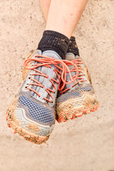 Slippers filled with mud after a Spartan race