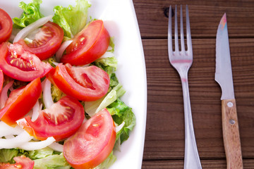 lettuce and tomato salad, diet and food concept