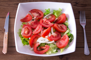 lettuce and tomato salad, diet and food concept