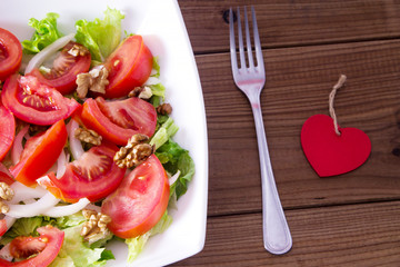 lettuce and tomato salad, diet and food concept