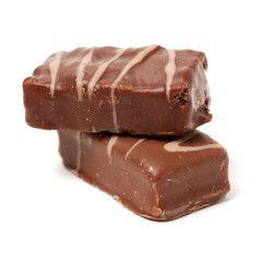 Chocolate peanut candy on white background