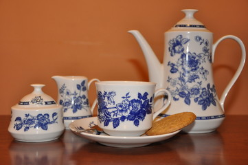 Elegant vintage coffee porcelain drink set on wooden table