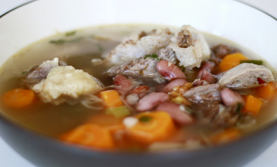 Red kidney bean soup on white background. Indonesian food. 