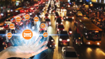 Fototapeta premium Hand holding with car claim icons over the Network connection on car crash background, car accident for car insuranc claim concept