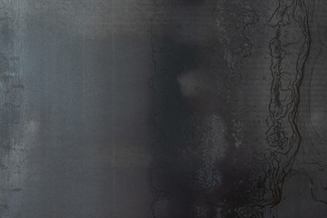 Grunge metal background or texture with scratches and cracks..