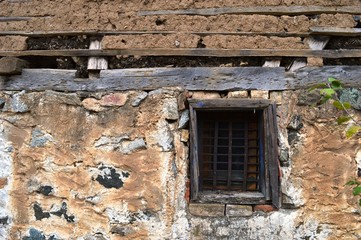 window on old abandoned house