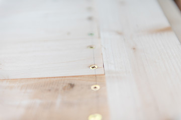 Screws in a board. many screws in the board. shield from the boards.