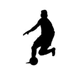 Fototapeta na wymiar Silhouette of football player moving the ball isolated on white background