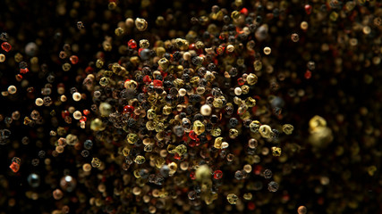 Whole coloured pepper spice flying in the air