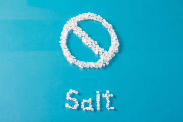 Word and sign consists of sea salt crystals, the concept of harm to health