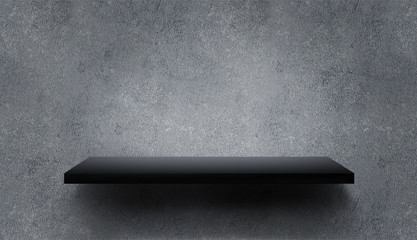 Dark shelf on gray wall. Mockup black shelf for your design on gray concrete background.
