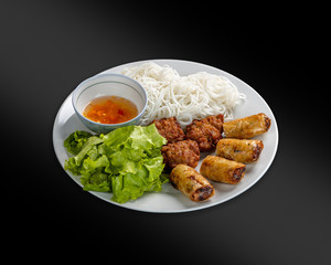 Cha Gio - the general name for rice paper rolls with meat, seafood, vegetables, usually deep-fried; served with various sauces.