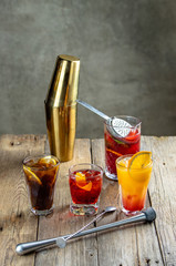 alcoholic cocktails: long island ice tee, tequila sunrise, negroni