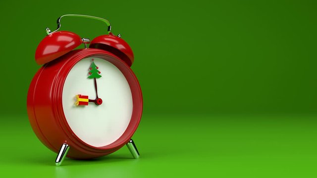 Alarm clock with Christmas tree-shaped tips with baubles and a red gift with a yellow ribbon. Wake up, it's time. Counts down the moment to give away presents on Christmas. Channel for background.