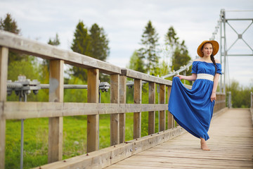 Girl in the countryside in the evening