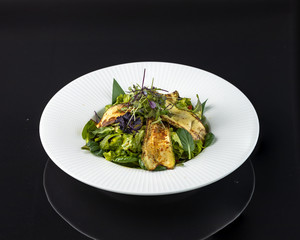 Warm salad with zucchini and avocado Romano salad, avocado, bell pepper, zucchini, soy sauce, Shichimi seasoning olive oil, cherry