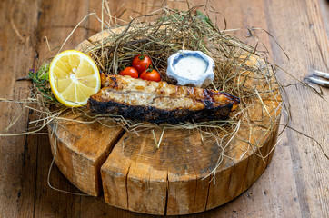 Grilled Black Sea flounder with lemon and sauce