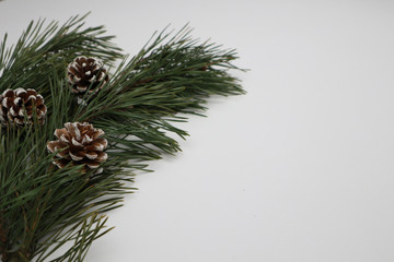 New year eve flatlay. Christmas tree and decorations. 2020. Merry Christmas mood. Celebration. White background.  Gifts. Winter holiday. Mockup. Copy space for text. Xmas.