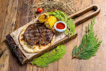 marbled beef steak with baked potatoes.