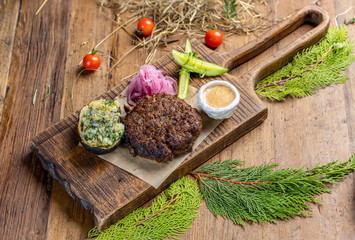 marbled beef steak with baked potatoes.
