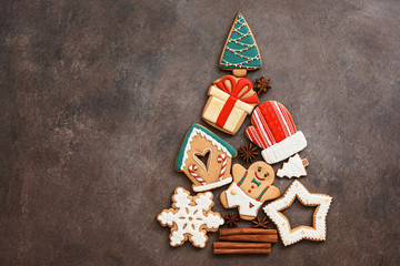 Abstract Christmas tree from gingerbread. Beautiful festive background with various gingerbread...