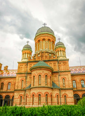 Obraz premium Chernivtsi city, Bukovina, Ukraine - June 12, 2018: building of the Residence of Metropolitan Bukovina and Dalmatia and the National University named after Yuri Fedkovych in the city of Chernivtsi