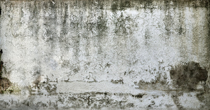 Old chipped white wall texture with moisture - dirty and creepy pattern for background