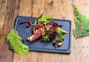 grilled octopus with citrus salsa and herbs